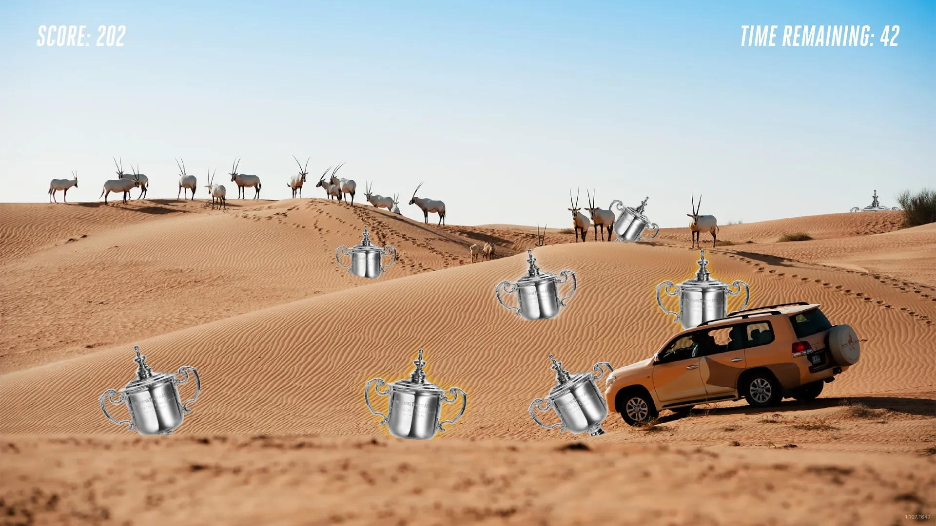 Desert scene with trophies popping up between the dunes