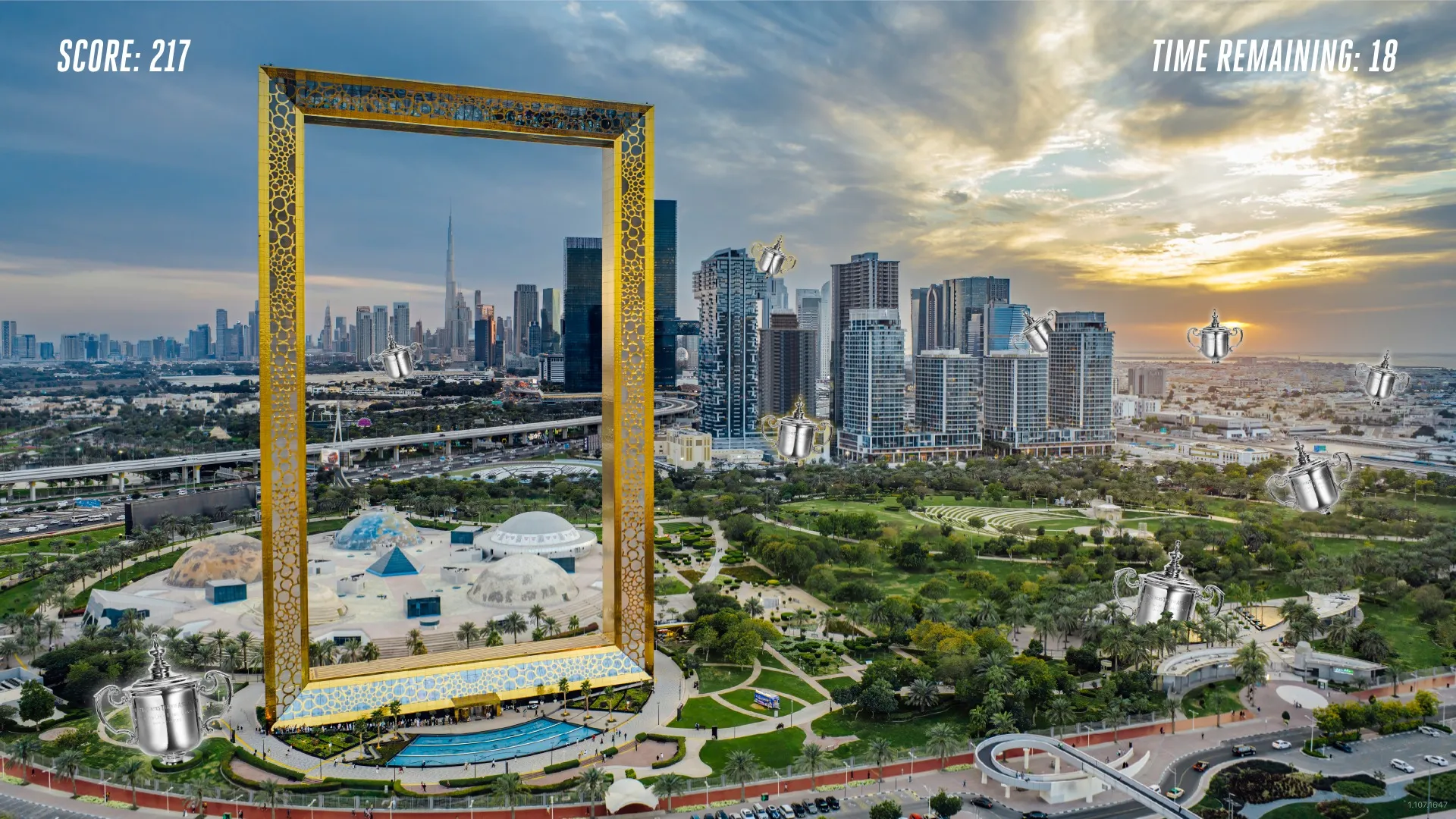 Dubai Frame scene with trophies spread across the city view