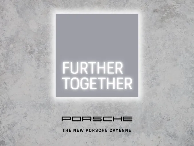 Further Together artwork on concrete with the Porsche wordmark and the line The new Porsche Cayenne